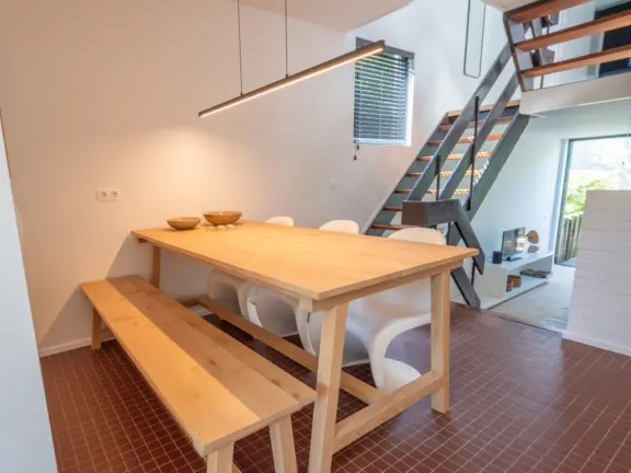 Vakantiehuis wijk de brabander 115 cadzand eettafel met woonkamer