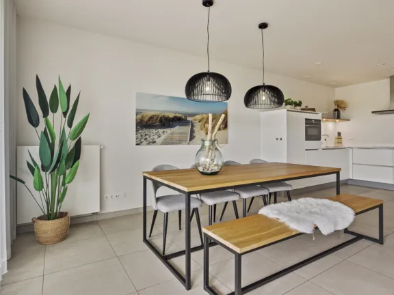 Appartement strandresidentie cadzand woonkamer tafel