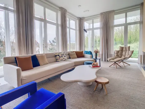 0 badhuis cadzand 2 E006 woonkamer zithoek ramen