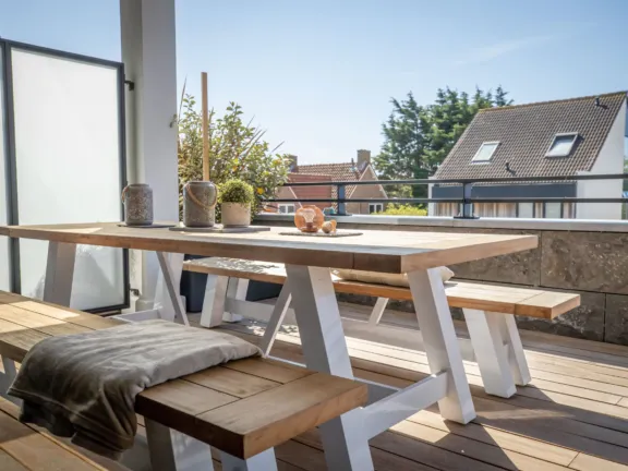 Maison la belle de branding cadzand eettafel terras