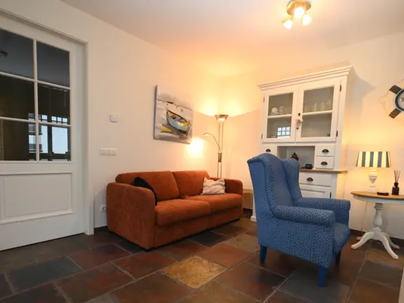 Appartement duindoorn 301 cadzand woonkamer bank