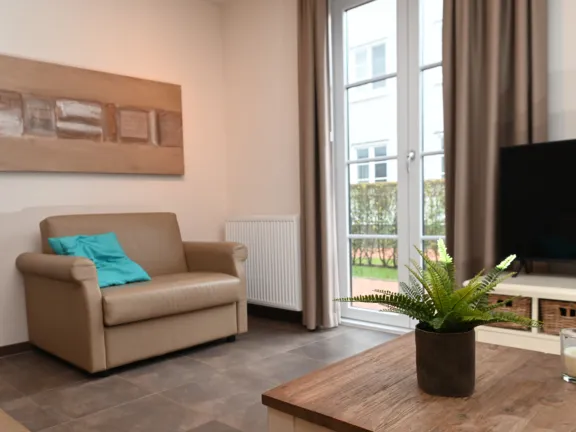 Duinhof 5 6 appartement cadzand woonkamer tv 2