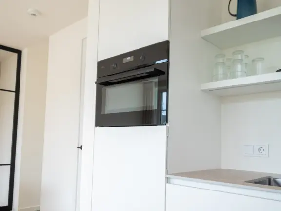 The hamptons cadzand appartement lumiere keuken oven