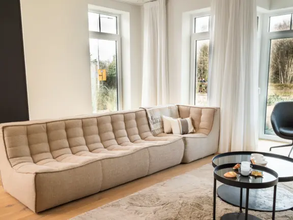 Vakantie appartement boulevard de wielingen 15 001 cadzand woonkamer bank