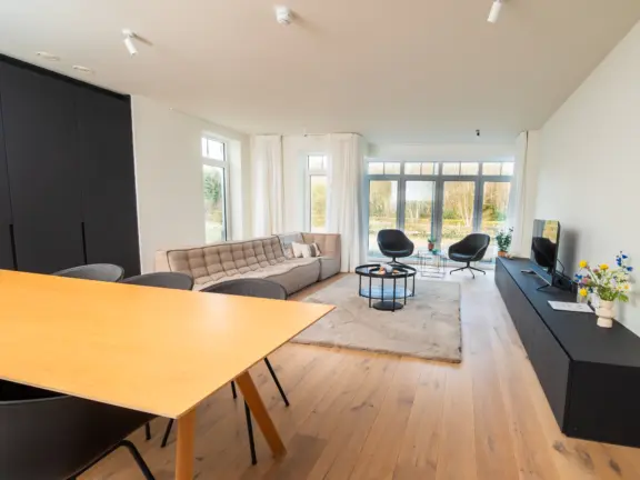 Vakantie appartement boulevard de wielingen 15 001 cadzand woonkamer woonkamer en eettafel 2