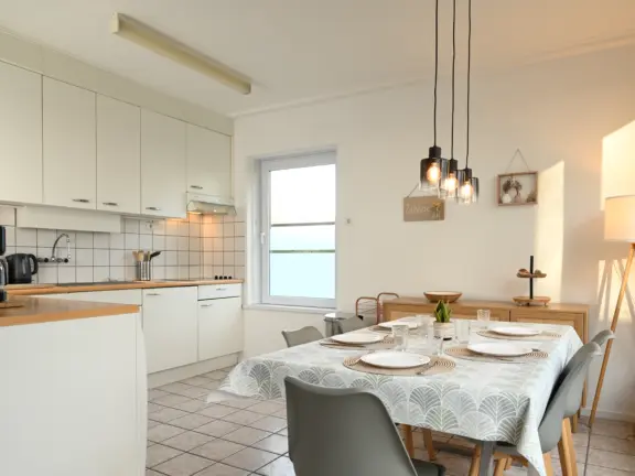 Ferienhaus nachtegalenstraat 11a cadzand kuche esstisch