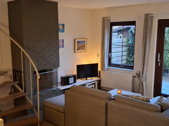 Spaanse galeien 66 vakantiehuisje cadzand woonkamer trap