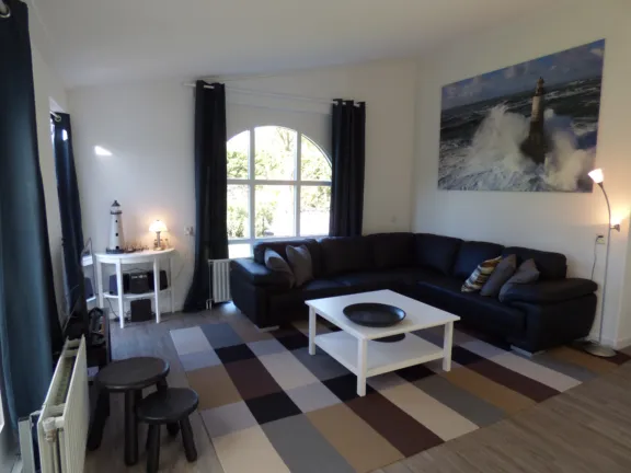 Vakantie bungalow boothuys grote christoffelstraat 11 cadzand woonkamer raam