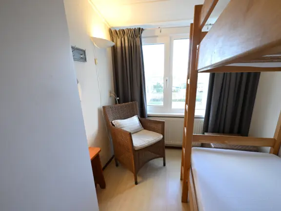 Vakantiehuis wijk de brabander 185 cadzand slaapkamer 2 stoel