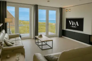 Badhuis cadzand appartement 2 F105 woonkamer zeezicht met AI bewerking