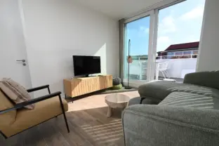 Luxe appartement boulevard 15 301 cadzand woonkamer en dakterras