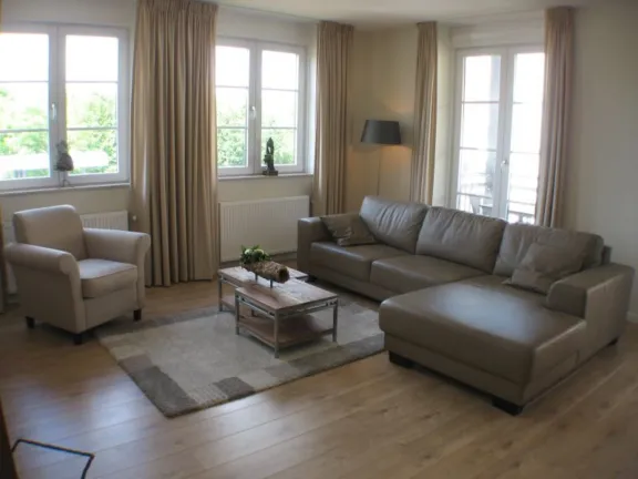 Appartement duinhof 1 6 11 cadzand woonkamer zicht