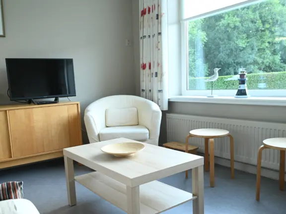 Windhorst hennequinlaan 17 cadzand bad woonkamer tv