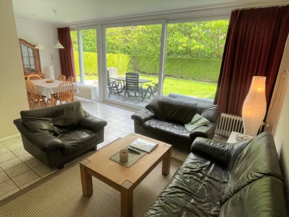 Ferienhaus nachtegalenstraat 11a cadzand wohnzimmer gartenblick