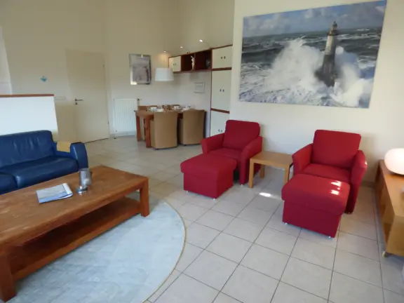 Appartement alledeske boven hennequinlaan 25c cadzand woonkamer zithoek