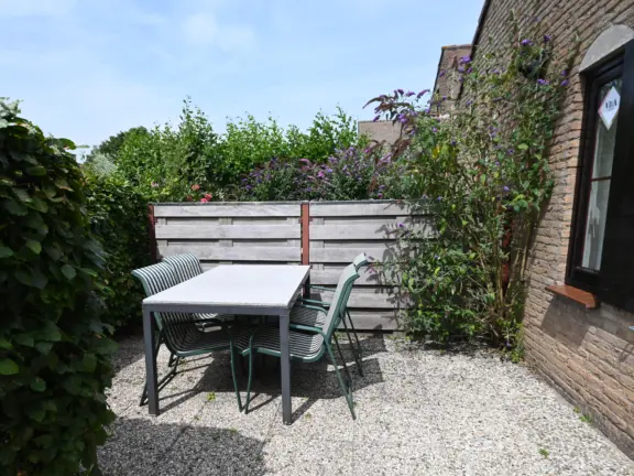 Spaanse galeien 68 cadzand bad voortuin tuintafel raam