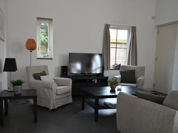 Bungalow kaapvaartstraat 5 cadzand hakuna matata woonkamer zitje